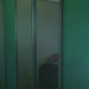Зеркальные двери-купе в квартире на ул.Карпинского
